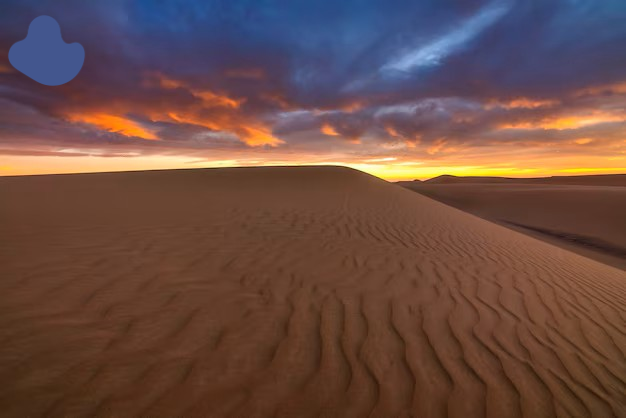 Desert Glamping Tour Morocco Price at Erg Chebbi dunes during sunset