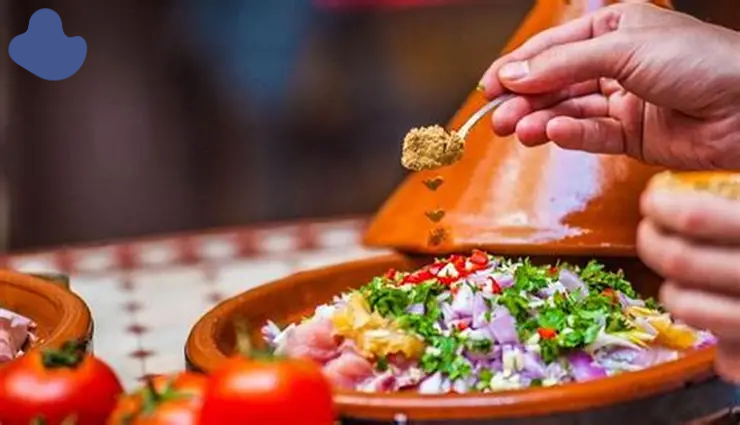 Moroccan cooking classes Marrakech preparing tagine