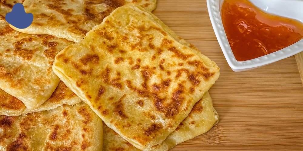 Moroccan msemen pancakes with honey and mint tea